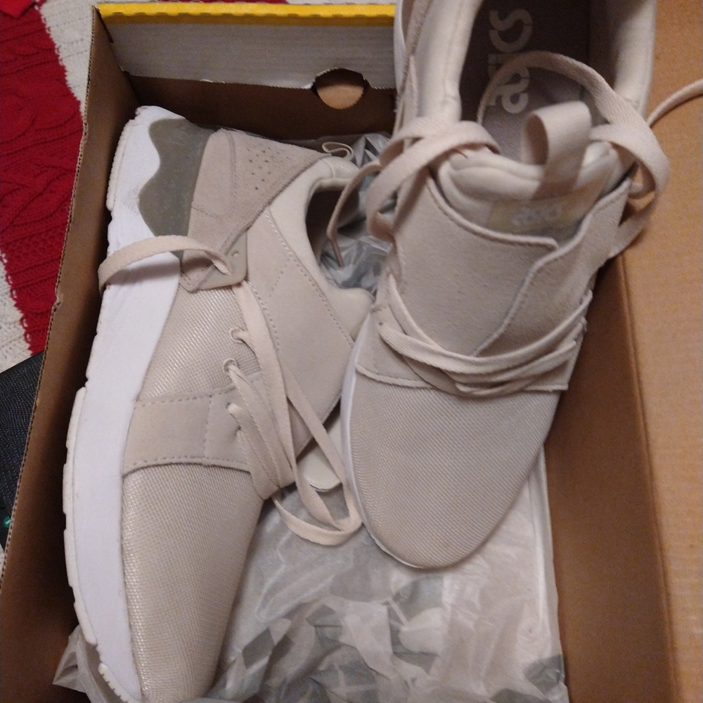 New Asics running shoes,no tag worn only in house.Tan color with straps and lace